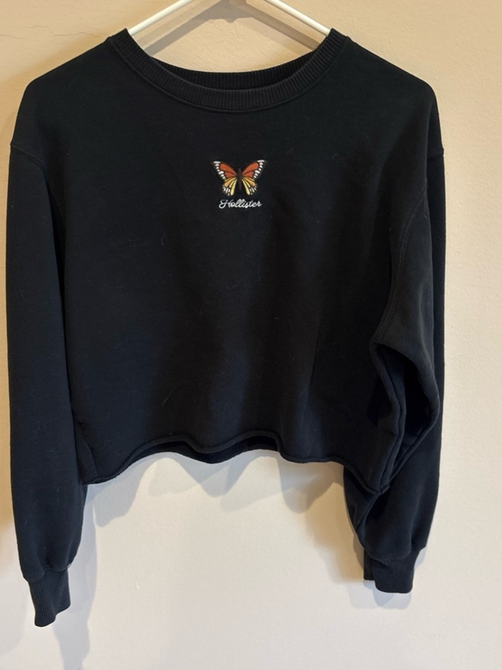 Hollister Black Cropped Sweatshirt with Orange Butterfly